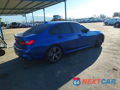 Trzecie zdjęcie samochodu z tyłu: 2021 BMW 330I VIN:3MW5R1J01M8B99116 - miniatura