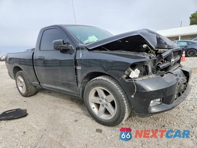 Czwarte zdjęcie samochodu z boku: 2012 DODGE RAM 1500 ST VIN:3C6JD6AT7CG279717 - miniatura