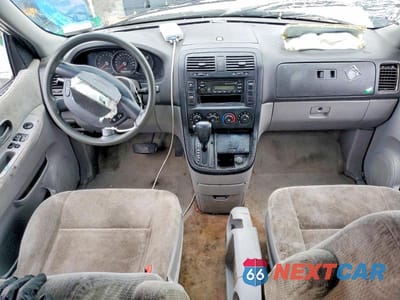 Zdjęcie 8 z 13 samochodu: 2005 KIA SEDONA VIN:KNDUP132156770339 - miniatura