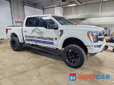 Czwarte zdjęcie samochodu z boku: 2022 FORD F150 SUPERCREW VIN:1FTFW1E58NFA19953 - miniatura