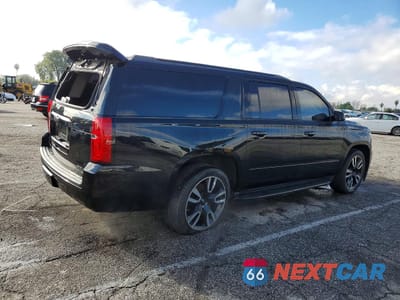 Trzecie zdjęcie samochodu z tyłu: 2019 CHEVROLET SUBURBAN K1500 PREMIER VIN:1GNSKJKJXKR101261 - miniatura