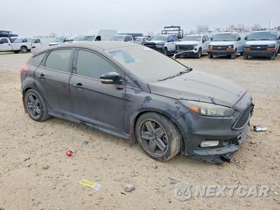 Czwarte zdjęcie samochodu z boku: 2016 FORD FOCUS ST VIN:1FADP3L98GL406941 - miniatura