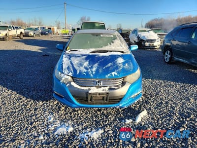 Piąte zdjęcie samochodu w środku: 2010 HONDA INSIGHT EX VIN:JHMZE2H79AS019172 - miniatura