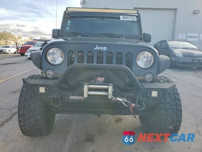 Piąte zdjęcie samochodu w środku: 2014 JEEP WRANGLER UNLIMITED SPORT VIN:1C4BJWDG3EL325019 - miniatura