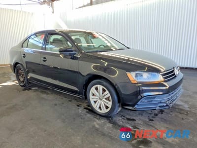 Czwarte zdjęcie samochodu z boku: 2017 VOLKSWAGEN JETTA S VIN:3VW2B7AJ3HM332295 - miniatura