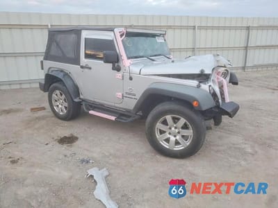 Czwarte zdjęcie samochodu z boku: 2012 JEEP WRANGLER SPORT VIN:1C4AJWAG8CL267194 - miniatura