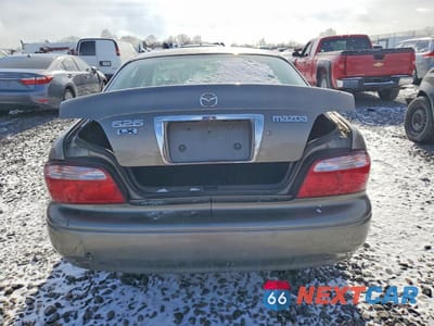 Zdjęcie 6 z 13 samochodu: 2001 MAZDA 626 ES VIN:1YVGF22CX15239215 - miniatura