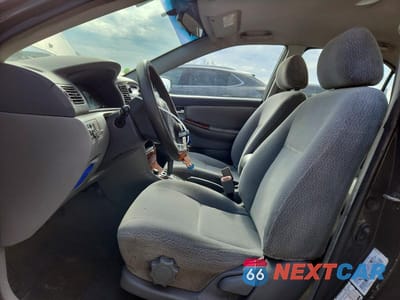 Zdjęcie 7 z 11 samochodu: 2004 TOYOTA COROLLA CE VIN:2T1BR32E74C290130 - miniatura