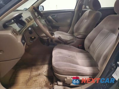 Zdjęcie 7 z 11 samochodu: 1997 TOYOTA CAMRY CE VIN:4T1BG22K5VU175466 - miniatura