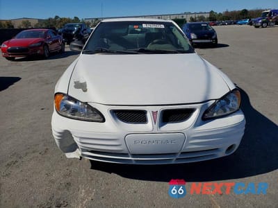 Piąte zdjęcie samochodu w środku: 2000 PONTIAC GRAND AM SE VIN:1G2NE52TXYM879883 - miniatura