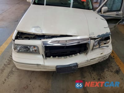 Zdjęcie 11 z 13 samochodu: 1996 LINCOLN TOWN CAR CARTIER VIN:1LNLM83W8TY616580 - miniatura