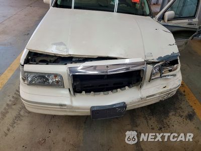 Zdjęcie 11 z 13 samochodu: 1996 LINCOLN TOWN CAR CARTIER VIN:1LNLM83W8TY616580 - miniatura