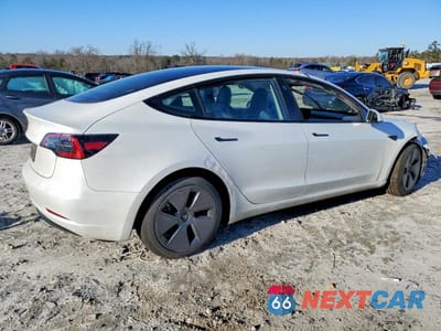 Trzecie zdjęcie samochodu z tyłu: 2023 TESLA MODEL 3 VIN:5YJ3E1EA5PF601311 - miniatura
