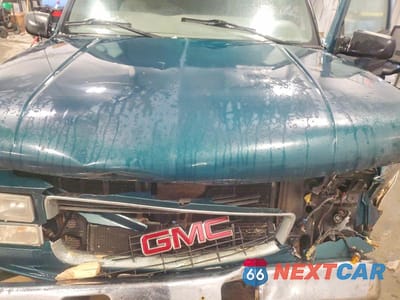 Zdjęcie 12 z 12 samochodu: 1999 GMC YUKON VIN:1GKEK13R0XJ795799 - miniatura