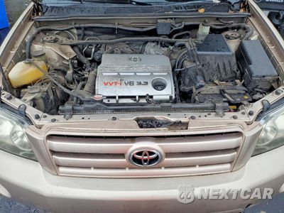 Zdjęcie 11 z 13 samochodu: 2004 TOYOTA HIGHLANDER VIN:JTEEP21A040036082 - miniatura