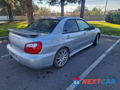 Czwarte zdjęcie samochodu z boku: 2004 SUBARU IMPREZA WRX STI VIN:JF1GD70624L509405 - miniatura
