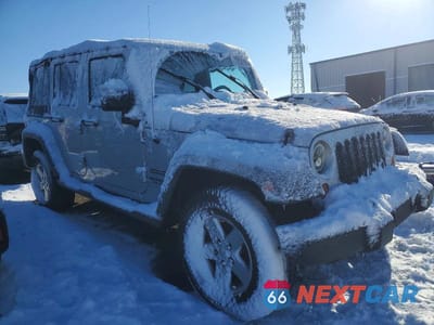 Czwarte zdjęcie samochodu z boku: 2011 JEEP WRANGLER UNLIMITED SPORT VIN:1J4BA3H16BL579415 - miniatura