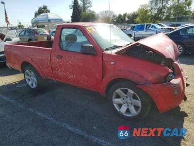 Czwarte zdjęcie samochodu z boku: 2001 NISSAN FRONTIER XE VIN:1N6DD21SX1C338391 - miniatura