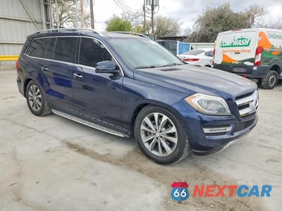 Czwarte zdjęcie samochodu z boku: 2014 MERCEDES-BENZ GL 450 4MATIC VIN:4JGDF7CE4EA321178 - miniatura