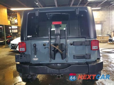 Zdjęcie 6 z 12 samochodu: 2015 JEEP WRANGLER UNLIMITED SPORT VIN:1C4HJWDG0FL656264 - miniatura