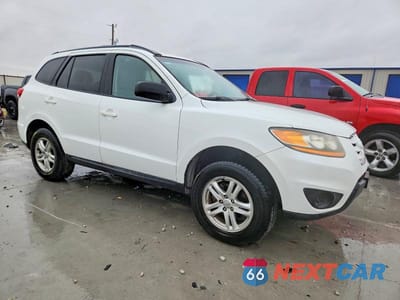 Czwarte zdjęcie samochodu z boku: 2010 HYUNDAI SANTA FE GLS VIN:5NMSGDAB4AH363592 - miniatura