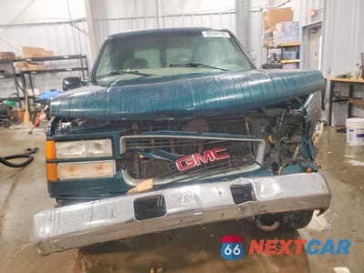 Piąte zdjęcie samochodu w środku: 1999 GMC YUKON VIN:1GKEK13R0XJ795799 - miniatura