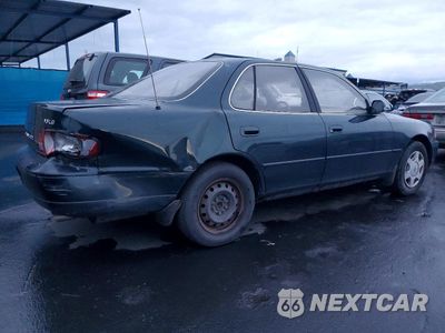 Trzecie zdjęcie samochodu z tyłu: 1995 TOYOTA CAMRY LE VIN:JT2GK12E1S0124877 - miniatura
