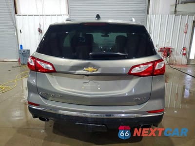 Zdjęcie 6 z 12 samochodu: 2018 CHEVROLET EQUINOX LT VIN:3GNAXTEX7JS625293 - miniatura