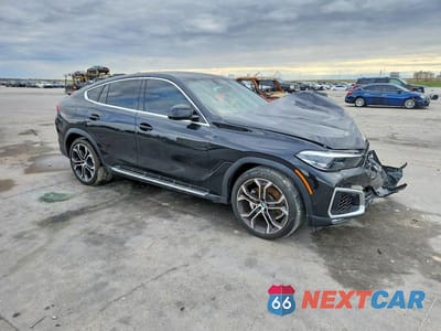 Czwarte zdjęcie samochodu z boku: 2021 BMW X6 SDRIVE 40I VIN:5UXCY4C02M9G60729 - miniatura