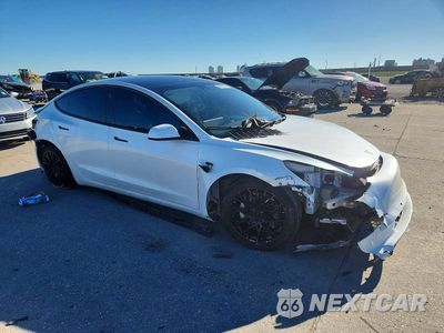 Czwarte zdjęcie samochodu z boku: 2022 TESLA MODEL 3 VIN:5YJ3E1EA9NF337989 - miniatura