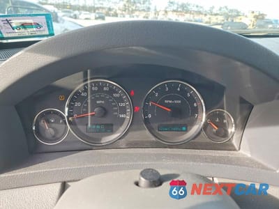 Zdjęcie 9 z 13 samochodu: 2007 JEEP GRAND CHEROKEE LAREDO VIN:1J8GR48K37C520986 - miniatura