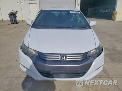 Piąte zdjęcie samochodu w środku: 2010 HONDA INSIGHT EX VIN:JHMZE2H7XAS018404 - miniatura