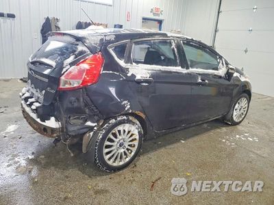Trzecie zdjęcie samochodu z tyłu: 2014 FORD FIESTA VIN:3FADP4FJ4EM163085 - miniatura
