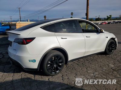 Trzecie zdjęcie samochodu z tyłu: 2022 TESLA MODEL Y VIN:7SAYGDEE6NF396165 - miniatura
