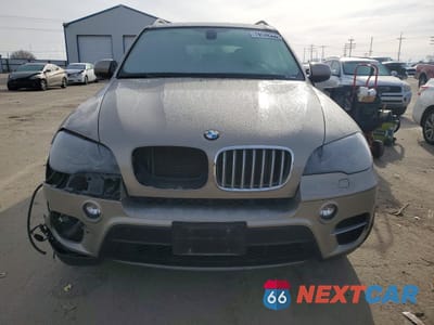 Piąte zdjęcie samochodu w środku: 2012 BMW X5 VIN:5UXZW0C52CL663889 - miniatura