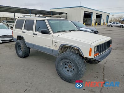 Czwarte zdjęcie samochodu z boku: 1997 JEEP CHEROKEE SPORT VIN:1J4FJ68S0VL528170 - miniatura