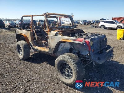 Czwarte zdjęcie samochodu z boku: 2012 JEEP WRANGLER SPORT VIN:1C4AJWAG3CL132964 - miniatura