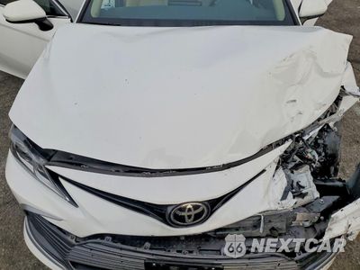 Zdjęcie 11 z 13 samochodu: 2021 TOYOTA CAMRY LE VIN:4T1C11AKXMU594817 - miniatura