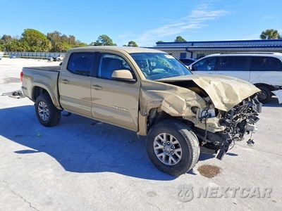 Czwarte zdjęcie samochodu z boku: 2016 TOYOTA TACOMA SR5 V6 VIN:5TFAZ5CN1GX009340 - miniatura