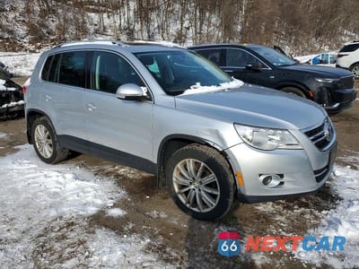 Czwarte zdjęcie samochodu z boku: 2011 VOLKSWAGEN TIGUAN S VIN:WVGBV7AX0BW518992 - miniatura