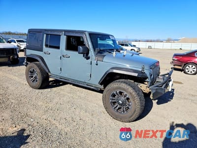 Czwarte zdjęcie samochodu z boku: 2014 JEEP WRANGLER UNLIMITED SPORT VIN:1C4BJWDGXEL311800 - miniatura