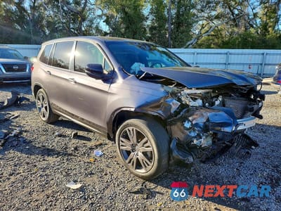 Czwarte zdjęcie samochodu z boku: 2021 HONDA PASSPORT EXL VIN:5FNYF7H5XMB016059 - miniatura