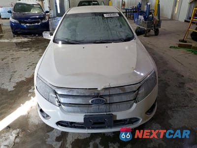 Piąte zdjęcie samochodu w środku: 2010 FORD FUSION S VIN:3FAHP0GA1AR213642 - miniatura