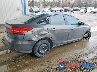 Trzecie zdjęcie samochodu z tyłu: 2016 FORD FOCUS SE VIN:1FADP3F26GL207417 - miniatura