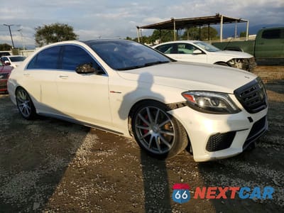 Czwarte zdjęcie samochodu z boku: 2015 MERCEDES-BENZ S 63 AMG VIN:WDDUG7JB2FA094493 - miniatura