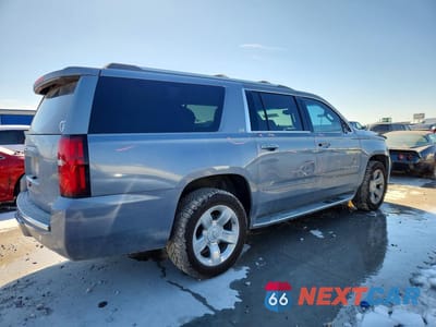 Trzecie zdjęcie samochodu z tyłu: 2015 CHEVROLET SUBURBAN K1500 LTZ VIN:1GNSKKKC5FR730682 - miniatura