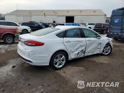 Trzecie zdjęcie samochodu z tyłu: 2018 FORD FUSION SE HYBRID VIN:3FA6P0LU7JR171727 - miniatura