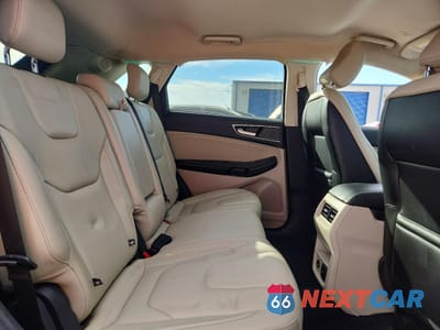 Zdjęcie 11 z 14 samochodu: 2021 FORD EDGE TITANIUM VIN:2FMPK3K90MBA18424 - miniatura