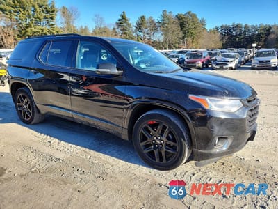 Czwarte zdjęcie samochodu z boku: 2018 CHEVROLET TRAVERSE PREMIER VIN:1GNEVJKW0JJ168335 - miniatura