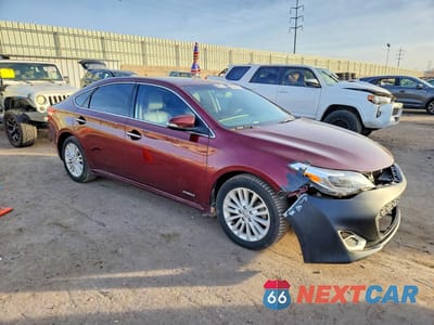 Czwarte zdjęcie samochodu z boku: 2013 TOYOTA AVALON HYBRID VIN:4T1BD1EB2DU009001 - miniatura